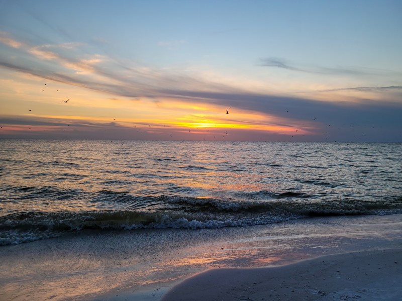 Sunset at the beach at Cortez Beach, Bradenton Beach, Florida. 