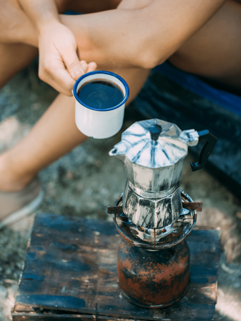 a woman drinking an espresso outdoors