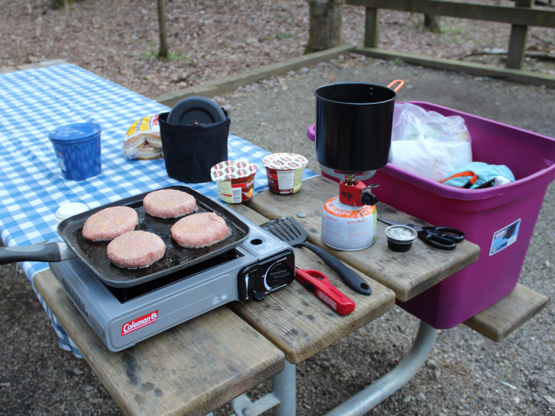 burgers on a camp stove