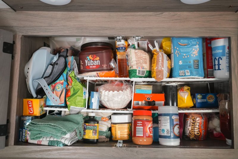 Pantry cabinet found in a rv kitchen featuring storage solutions for making the most of your cabinet space in a small kitchen.