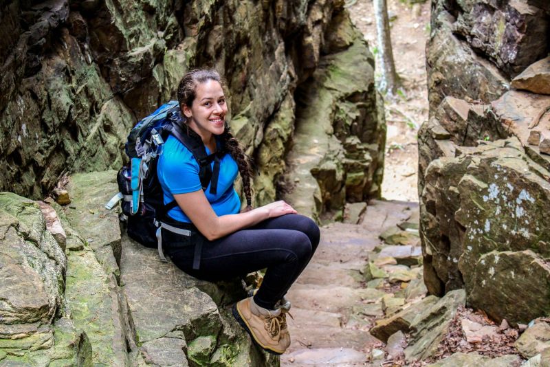 A woman "The Walking Mermaid's Jessica Tejera" backpacking through South Cumberland State Park in Tennessee. Camping Rules for Dispersed Camping