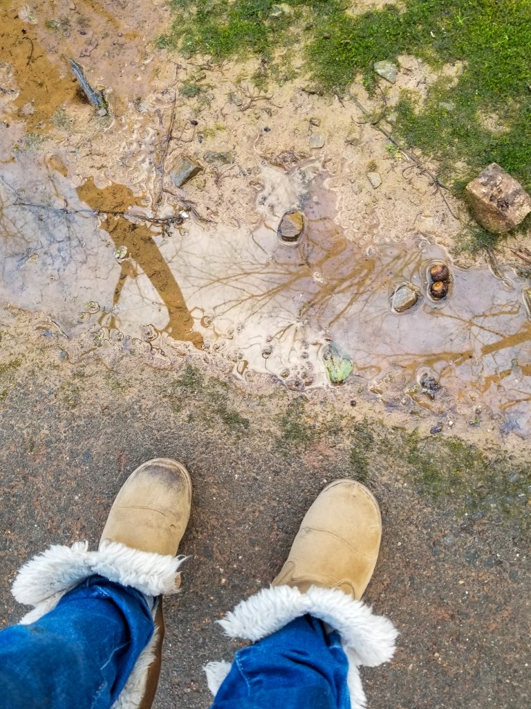 boots trail mud dirt water puddle sensory play playing outside outdoors 