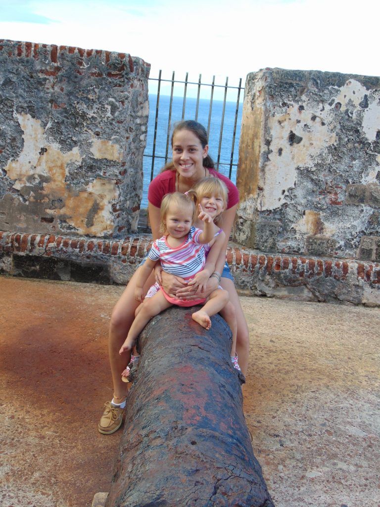 playing on a canon in el morro in viejo san juan puerto rico