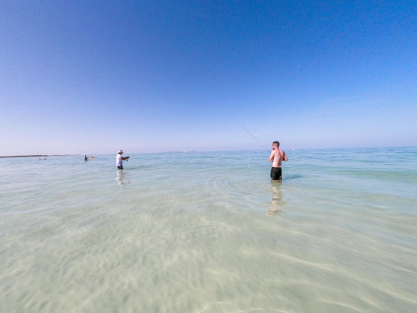 men fishing fishermen florida beach ft desoto st pete petersburg