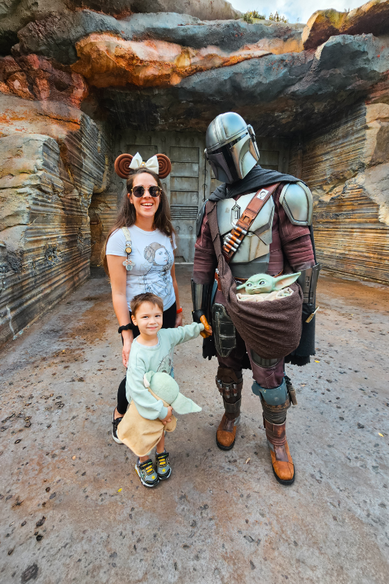 A mom and her son meeting The Mandalorian at Disney's Hollywood Studios at Walt Disney World in Orlando, Florida. Published on an article that teaches others how to become independent travel agents and how to travel more as a travel agent.