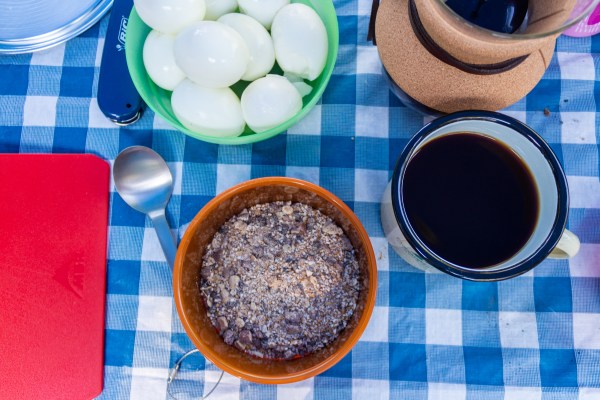 peak sherpa tsampa barley cereal with coffee and boiled eggs breakfast while camping