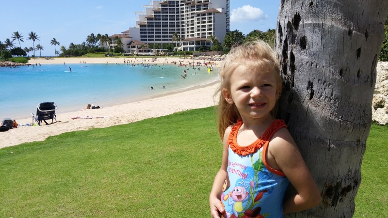 Kids at Ko'Olina Lagoon beach. Posted on a travel guide that features the best things to do with kids on Oahu, Hawaii. 