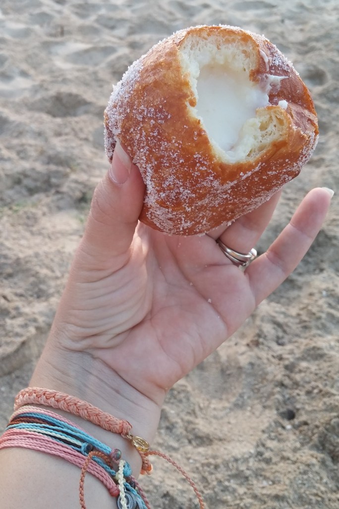 A delicious malasada from Leonard's Bakery in Honolulu, Hawaii. Posted on a travel guide that features the best things to do with kids on Oahu, Hawaii. 