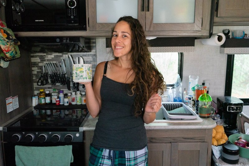 a mom enjoying a morning coffee in her pajamas