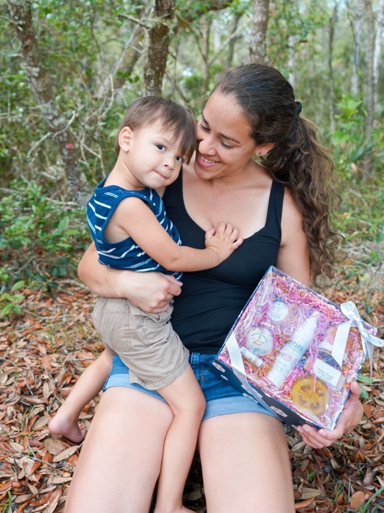 Mother and Son opening a mother's day gift.