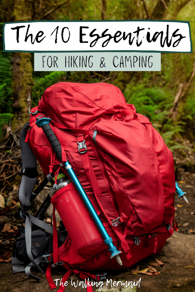 Red hiking backpacking backpack with water bottle and trekking poles. Posted on a blog post that talks about the ten essentials for camping and hiking.